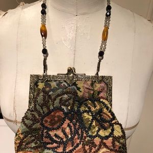 Small shoulder bad with old time styling